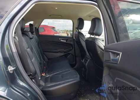 2023 Ford Edge Titanium z USA, uszkodzony, nr VIN 2FMPK4K94PBA27654